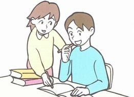 picture of children at the table in school with books