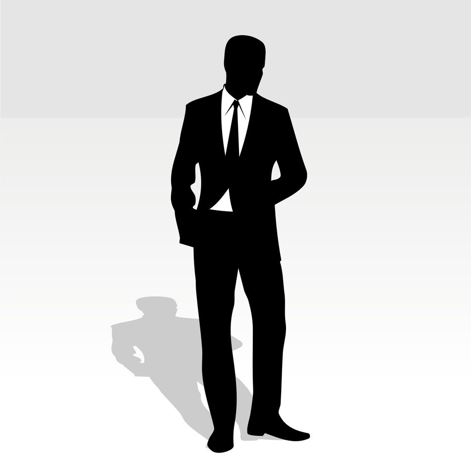 silhouette of a man in a black suit