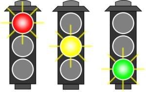 three traffic lights on a black background as a picture for clipart