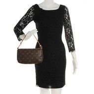 mannequin in a black dress in a bag