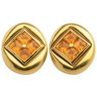 orange stones on gold jewelry