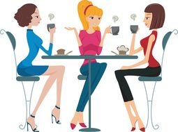 picture of girls sitting at the table