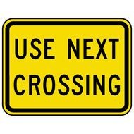 Road Crossing Sign Over Blue Sky