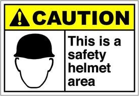 child's head in a helmet on a sign