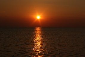 sunset light path on the sea