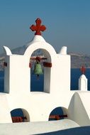 white bell tower with red cross, greece, Aeolian Islands