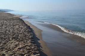 empty calm beach on a sunny day