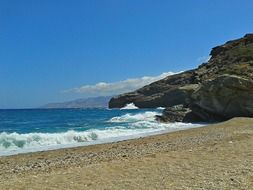 foamy waves at scenic wild coast, greece, andros