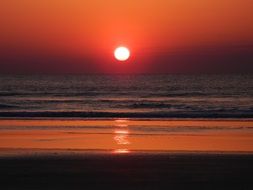 sun in the red sky at dusk
