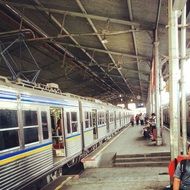 train with passengers at the railway station