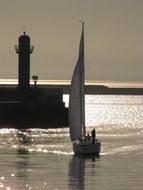 sailboat on sea at port