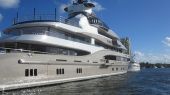 big luxury yacht on water at coast