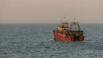 fishing schooner in the ocean off the coast of argentina