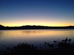 Colorful romantic sunset at lake