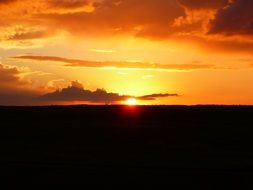 sunset on the black horizon