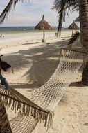 hammock over the sand on the beach