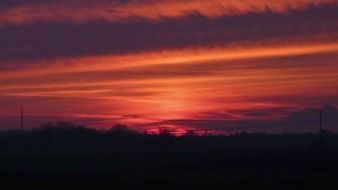 orange pink sunrise on the horizon