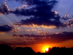 rays of sunset in the clouds