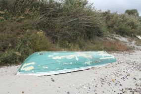 abandoned boat on the beach
