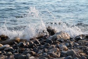 beach wave pebbles