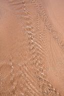 water stream on a sandy beach