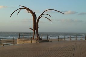 creative tree figure on the waterfront