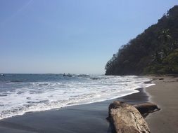 surfline on tropical beach at mountain