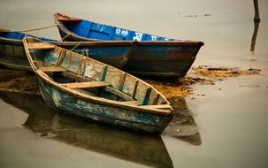 old wooden boats on a beach