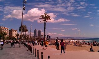 people on the beach in Barcelona