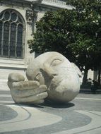 sculpture stone head and hand in Paris