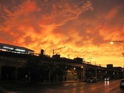 orange sunset at stormy sky, usa, illinois, chicago