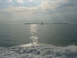 distant view of a boat in the ocean