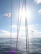 View from the yacht to the ocean in the glare of the sun