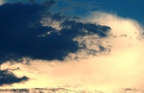 yellow golden glow through the clouds