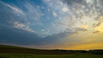 scattered clouds in the evening sky