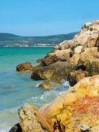 surf on rocky beach