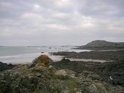 thunderclouds over a rocky coast in Brittany