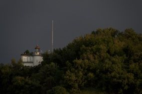 lighthouse tower in dramatic sunset