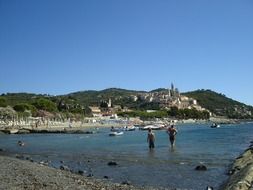 beach with stones summer scene in italy