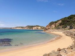 sand beach on rocky coast, australia, victoria