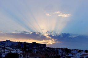 sunbeams behind a cloud in spain