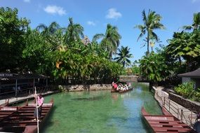 tourists in boat on tropical lake, usa, hawaii