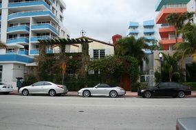 Houses and cars on the seafront in Miami