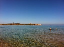 distant view of the lighthouse from the beach