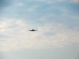 silhouette airplane in sky