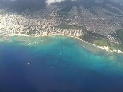 aerial view of modern city on coast, usa, hawaii