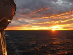 view from the ship to the evening sky in the clouds