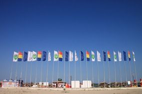 colored flags on beach, Romania, neptun resort