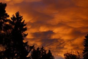 thick fiery clouds at sunse