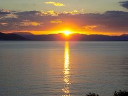 summer sunset above island, greece, aegina